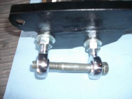 Heims mounted to plate with bushing bolt.jpg