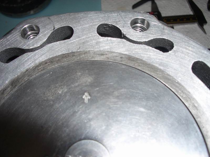 Piston at TDC as on case with stock base gasket.JPG